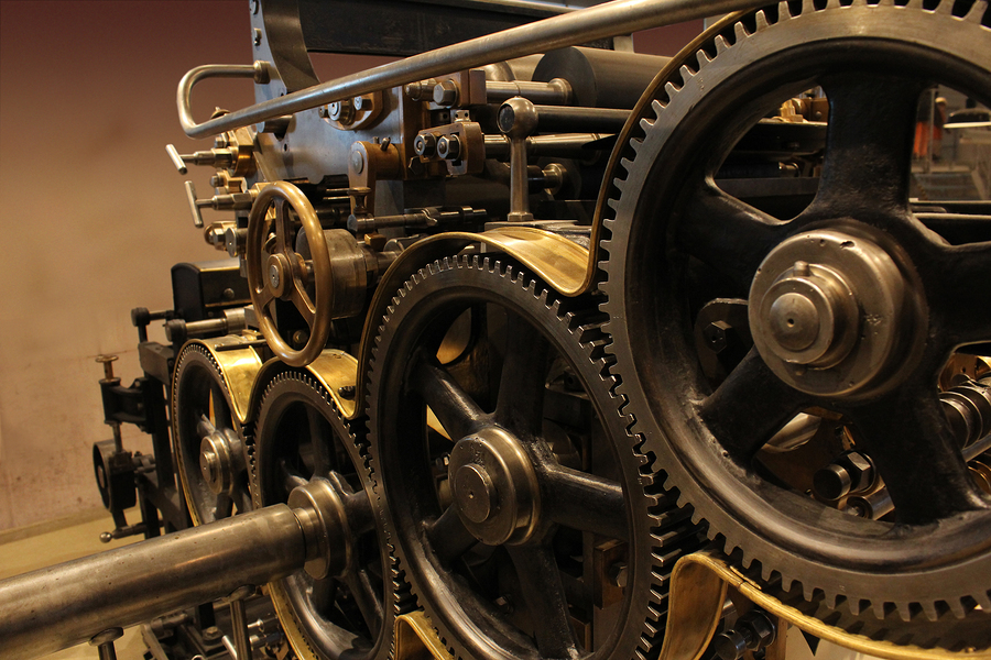 Old printing press - rotary machine - polygraphic equipment - big cog wheel